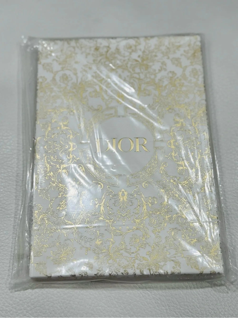 Dior White and Gold Embossed Floral Notebook Phone Case